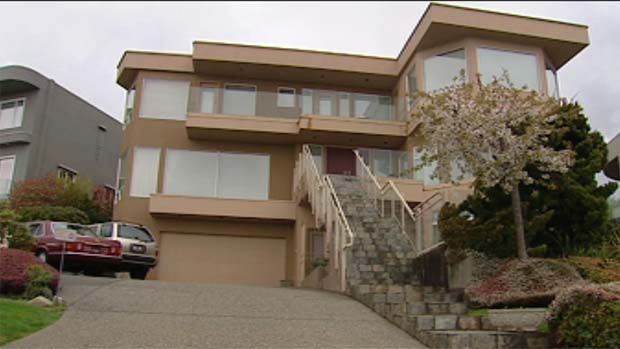 An African woman claims she was held as a virtual slave in this West Vancouver home for one year. CBC