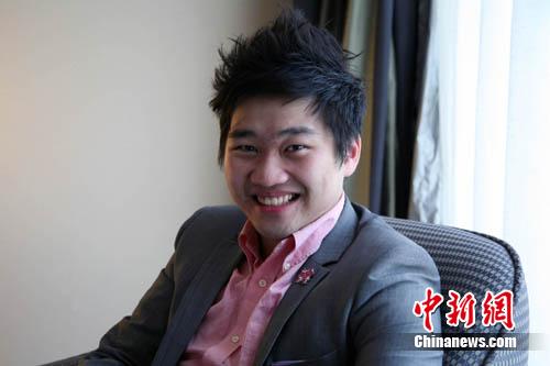 张敬龙：当选伦敦奥运火炬手点燃华人荣耀(图)
